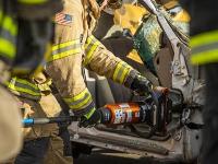 Firefighter using Hydraulic rescue tools