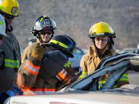 Firefighter using Hydraulic rescue tools