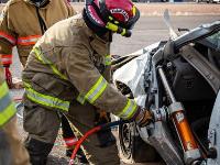 Firefighter using Hydraulic rescue tools