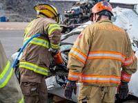 Firefighter using Hydraulic rescue tools