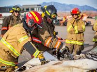 Firefighter using Hydraulic rescue tools