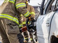 Firefighter using Hydraulic rescue tools