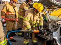 Firefighter using Hydraulic rescue tools