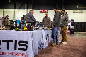 People standing at a booth