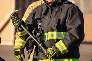 Firefighter with a crowbar