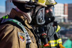 Firefighter with breathing apparatus