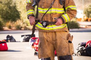 Firefighter with all gear on except helmet