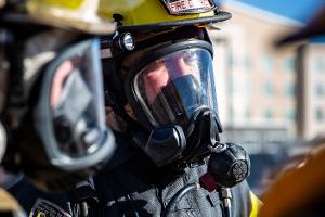 Firefighter with breathing apparatus