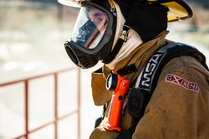 Firefighter with breathing apparatus