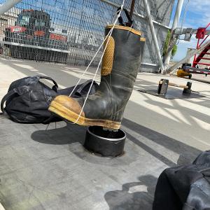 Weighted boot rigged for impact testing.