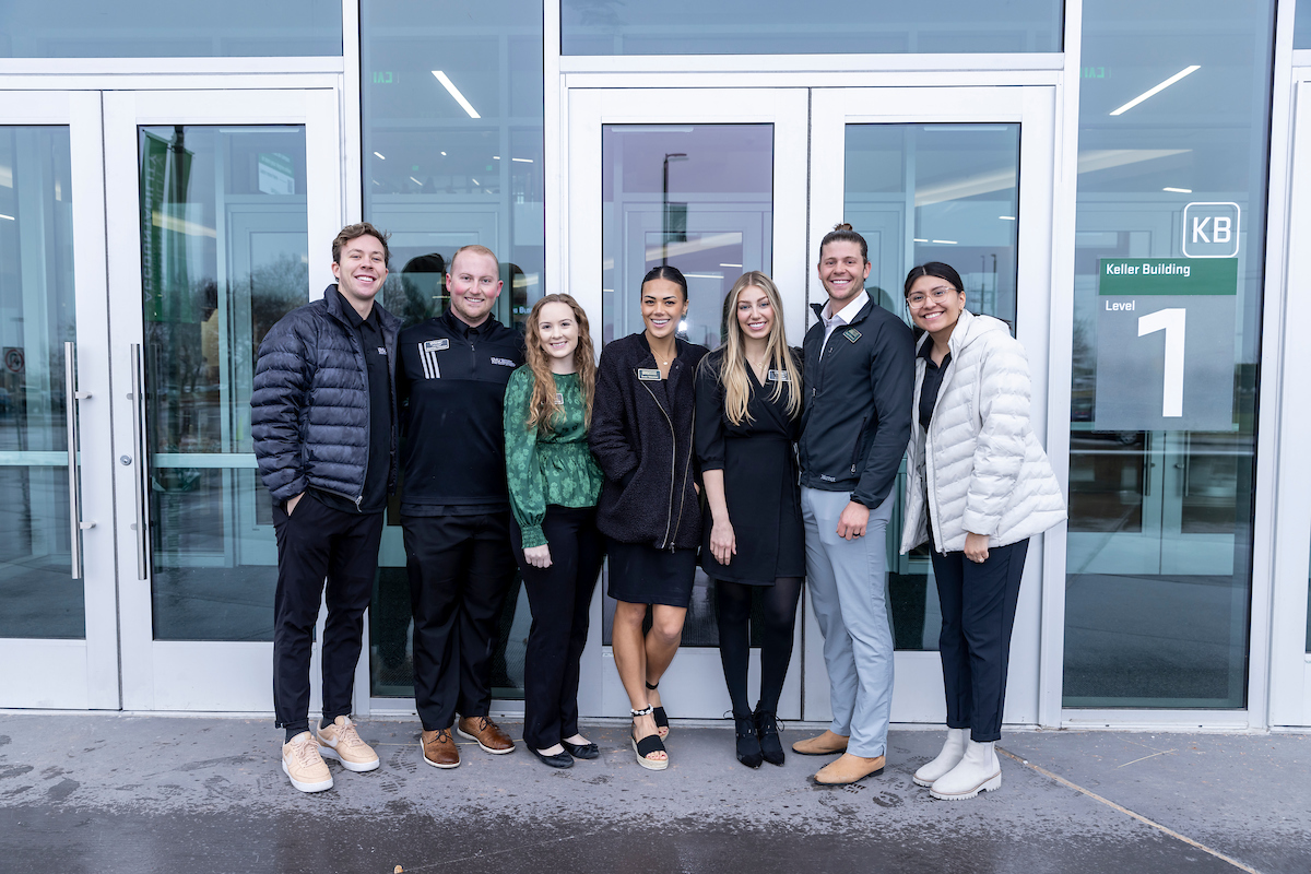 Event ambassadors help with event at the Keller building