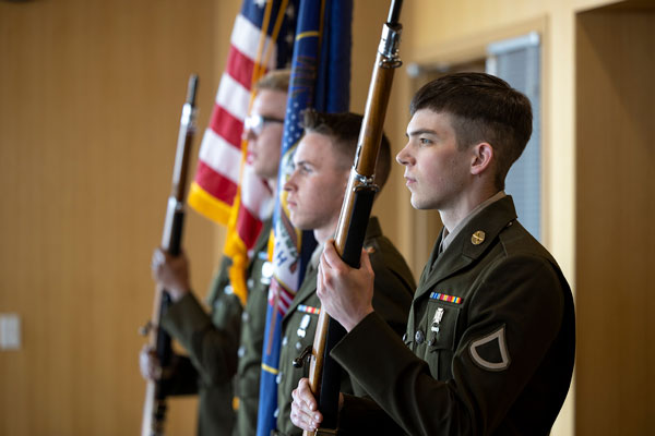 Military affiliated students participate in flag ceremony