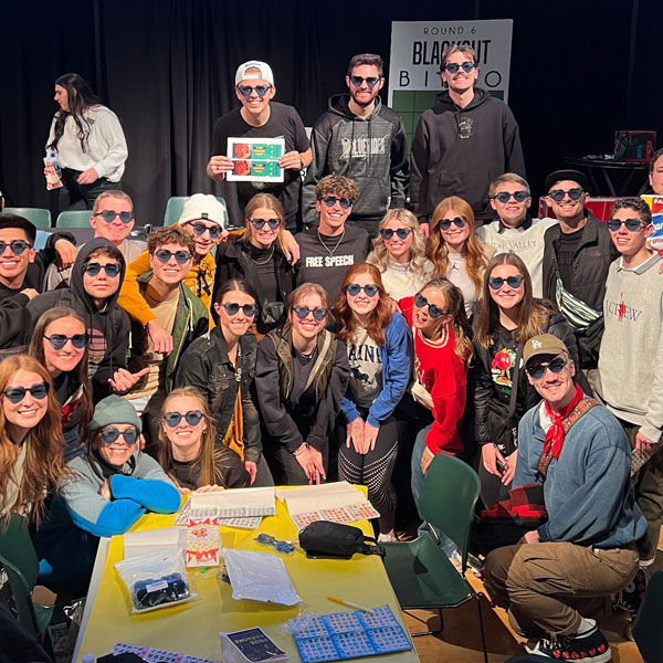 A large group of UVU ambassadors happy together