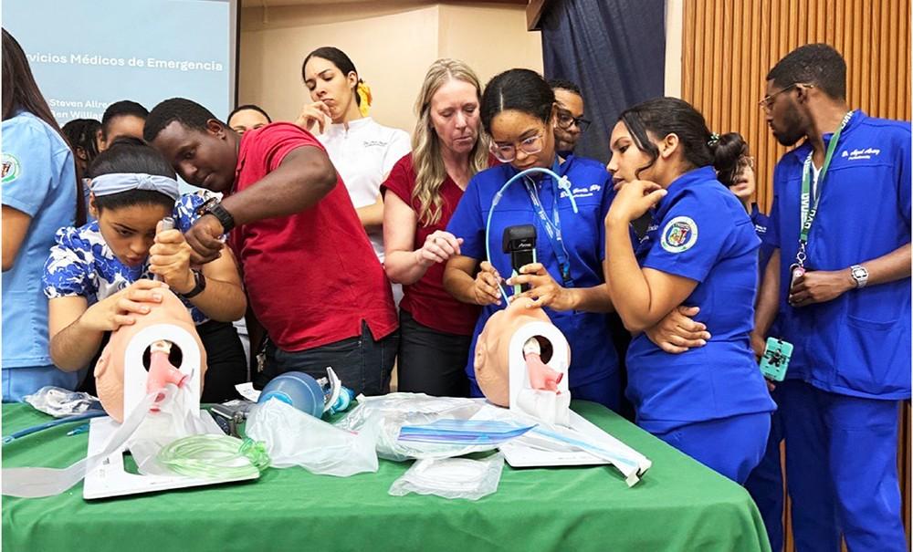 Students working on fake patient