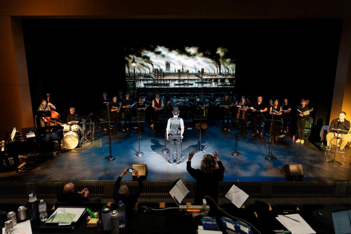 conductor in front of singers