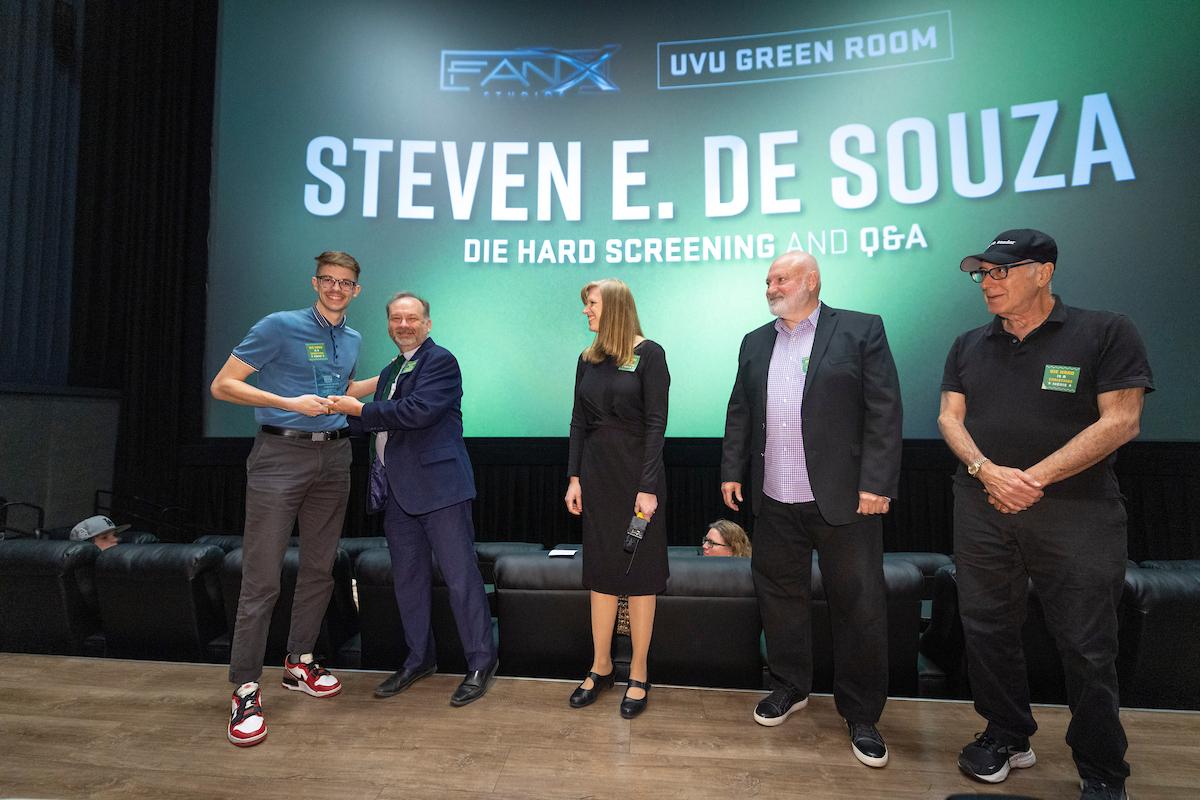 steven de souza on stage with provosts