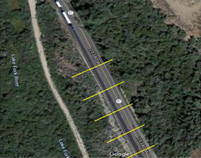 Image 04 satellite view of a road with yellow markings