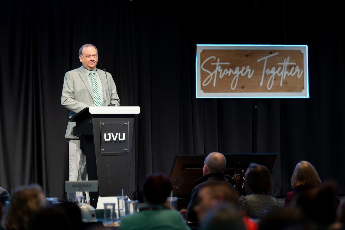 Wayne Vaught speaks on stage