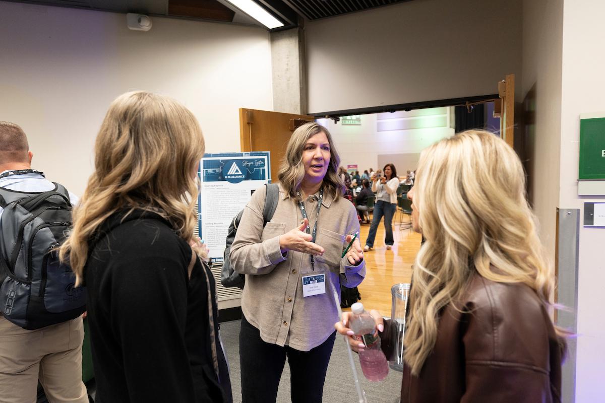 conference attendees in conversation