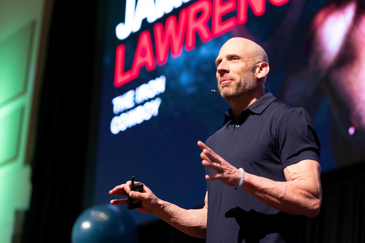 James Lawrence speaks on stage