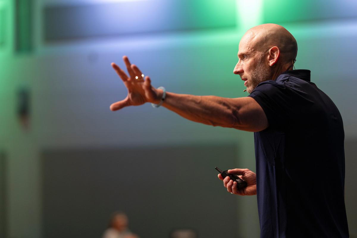 James Lawrence speaks on stage