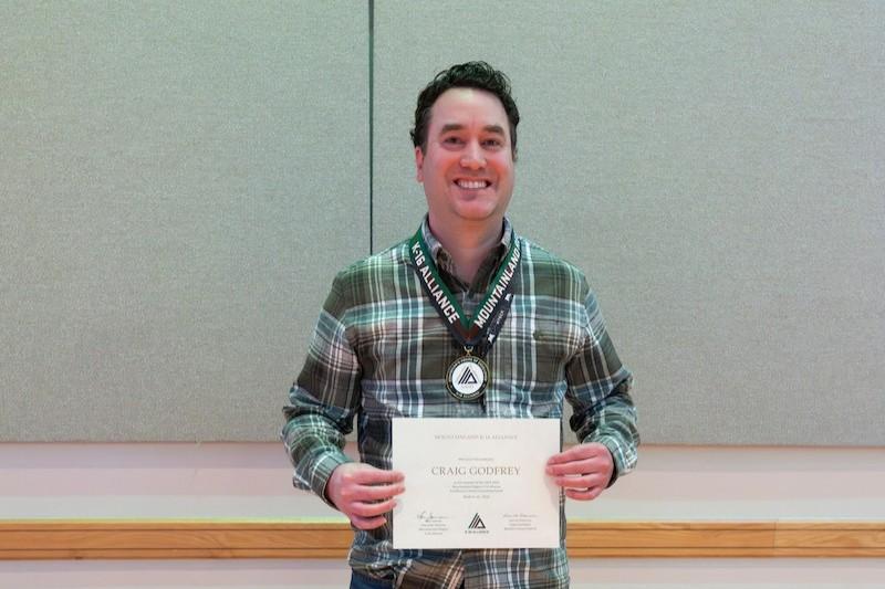 counselor with an award