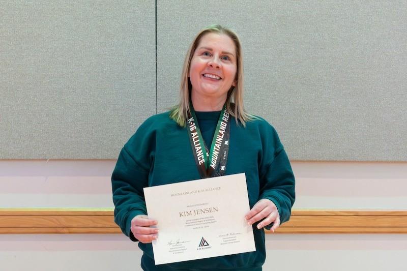 counselor with an award