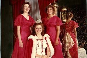  American Fork City Royalty 3 girls dressed in tiaras, dresses and a royal robe.