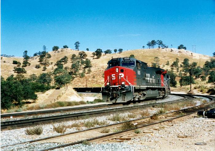 Historical color image of a red train.