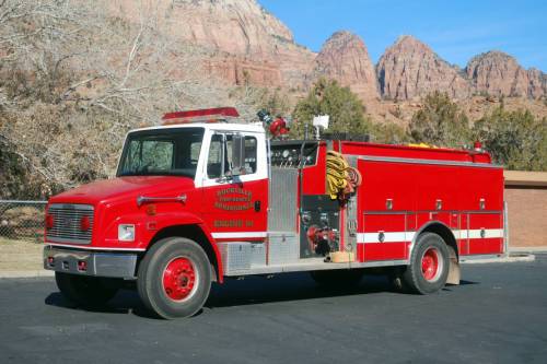 Color image of a historic fire truck.