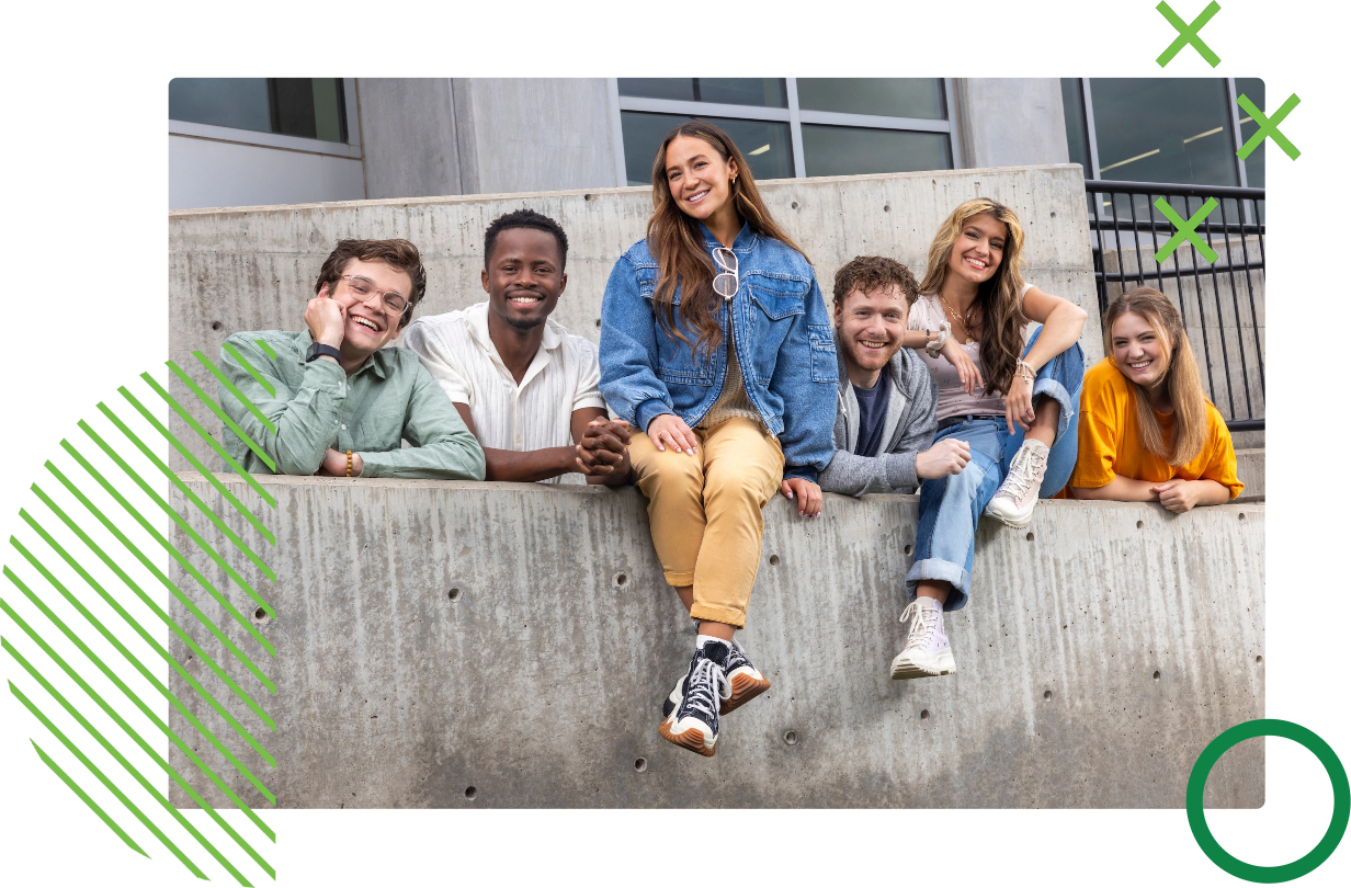 students posing on campus