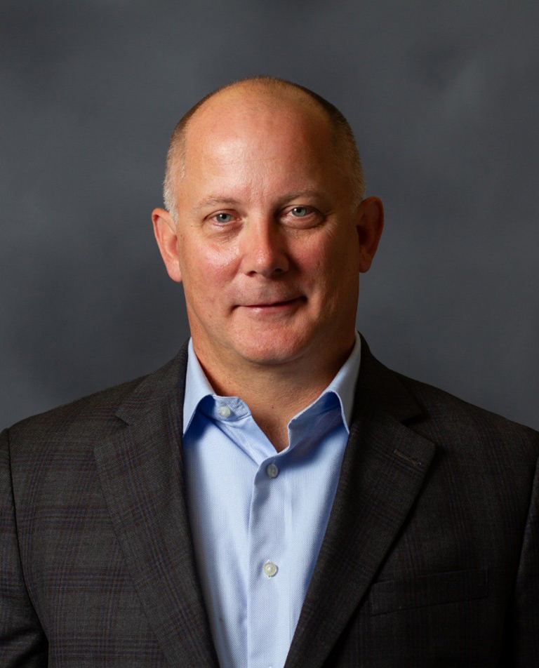 Headshot of Tom Schnaubelt