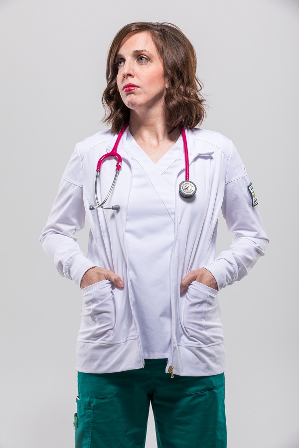 woman in nurse clothing staring to the left