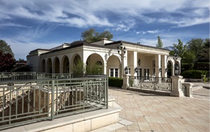 A photograph of the exterior of the pool house at Lakemount manor