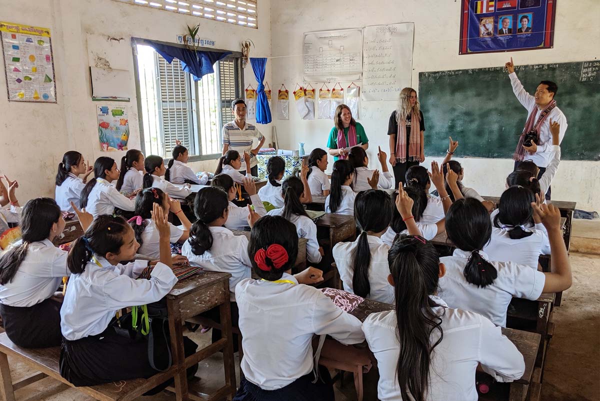 Professor Barthel and team teach in a crowded cambodian primary school.