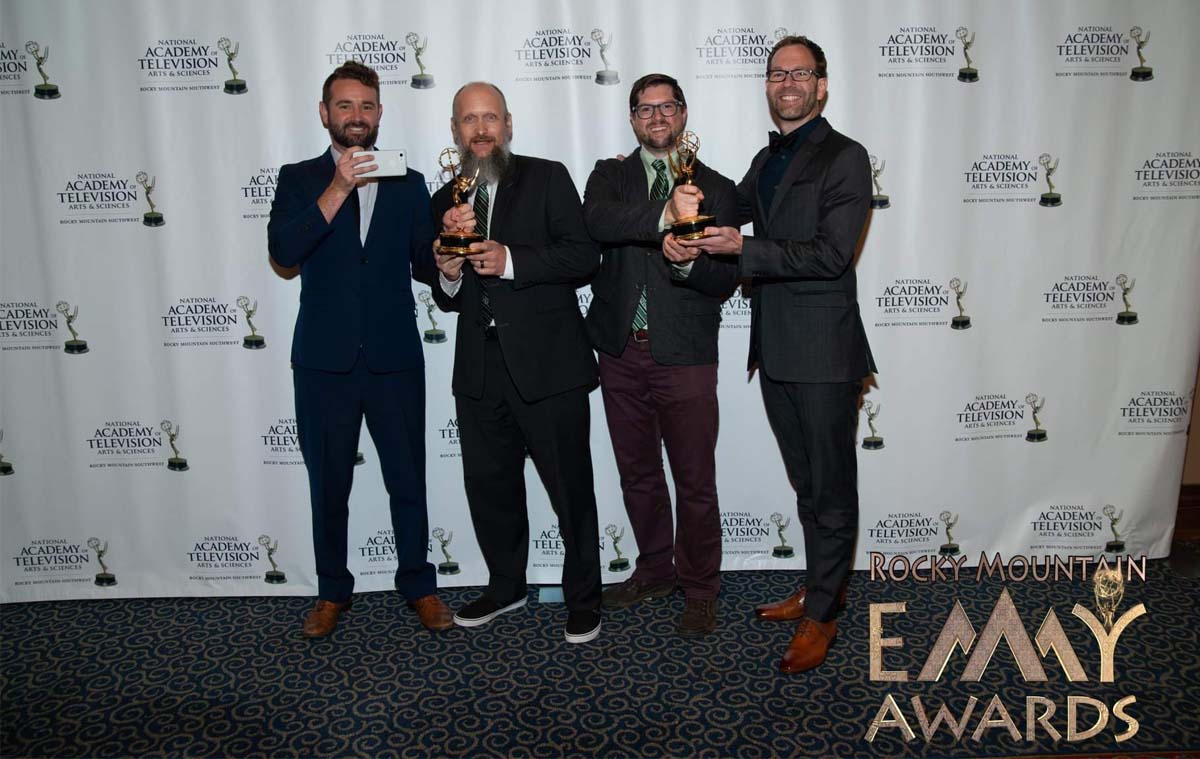 UVU Studios team accepting their emmy awards