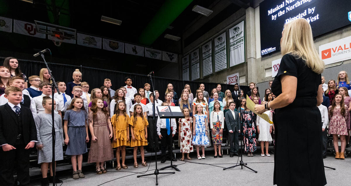 A children's choir performing at the key note event at UVU's Veterans Week.