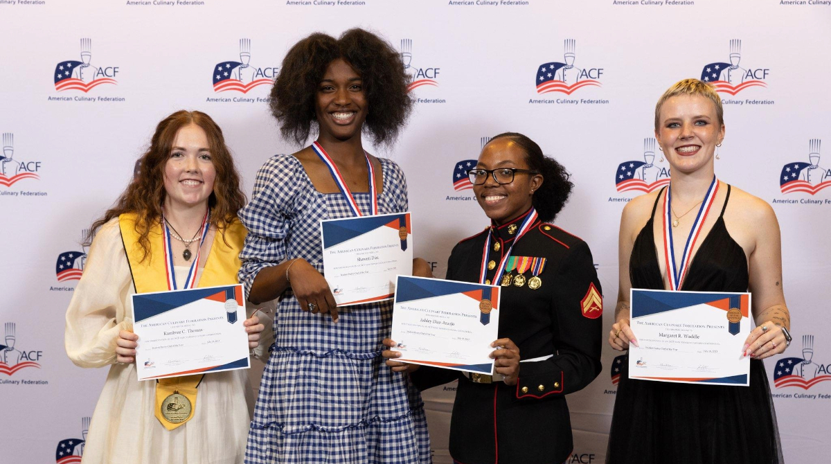Kambree Thomas poses with fellow winners