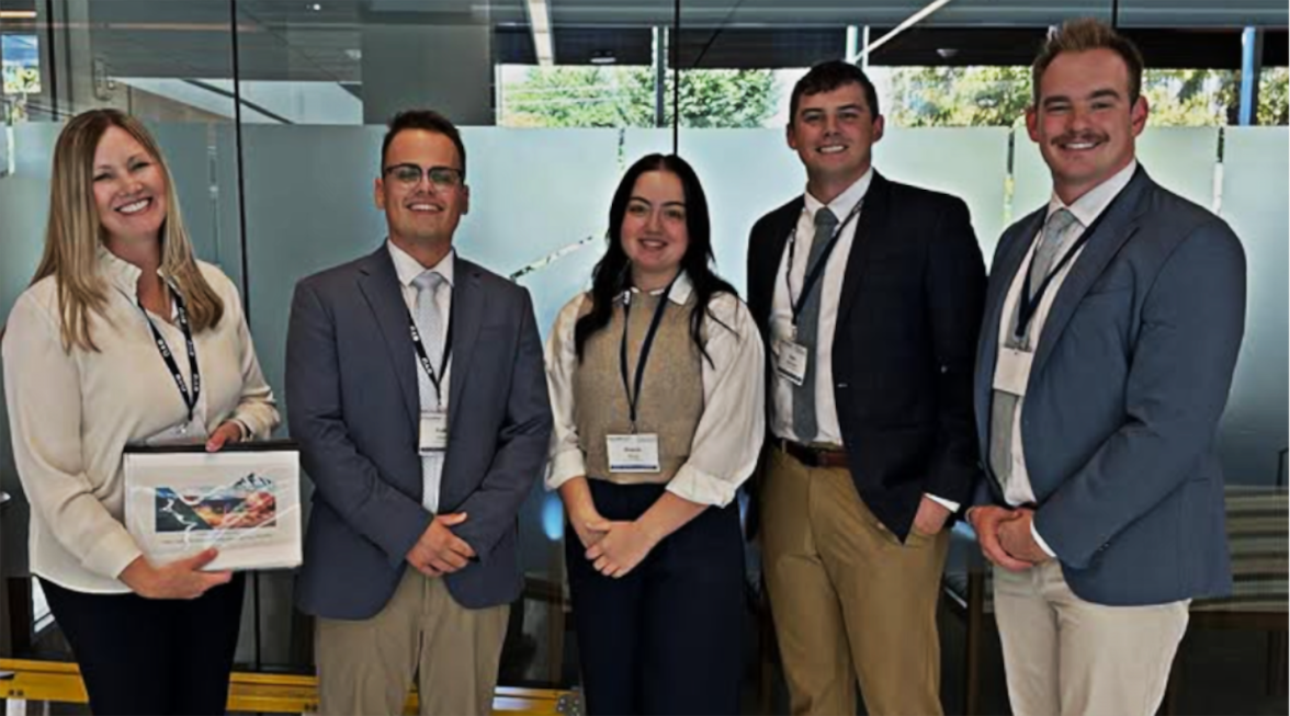 The winners of the 2025 Wasatch Cup pose with their advisor, Heather Thiesset