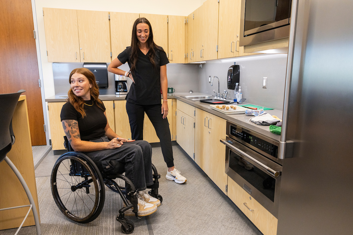 OTA students practice life skills in a kitchen setting