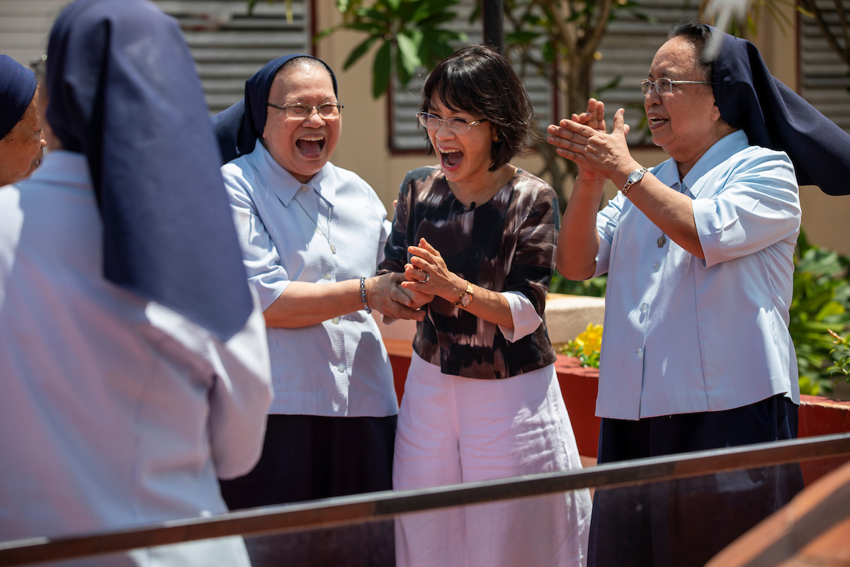 Astrid laughs with members of the Daughters of Charity in Iloilo.