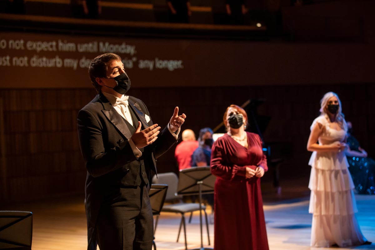 UVU students Samuel Plumb, Victoria Mancuso, and Louise Frazier wear masks while performing the opera “ The Importance of Being Earnest. ” 