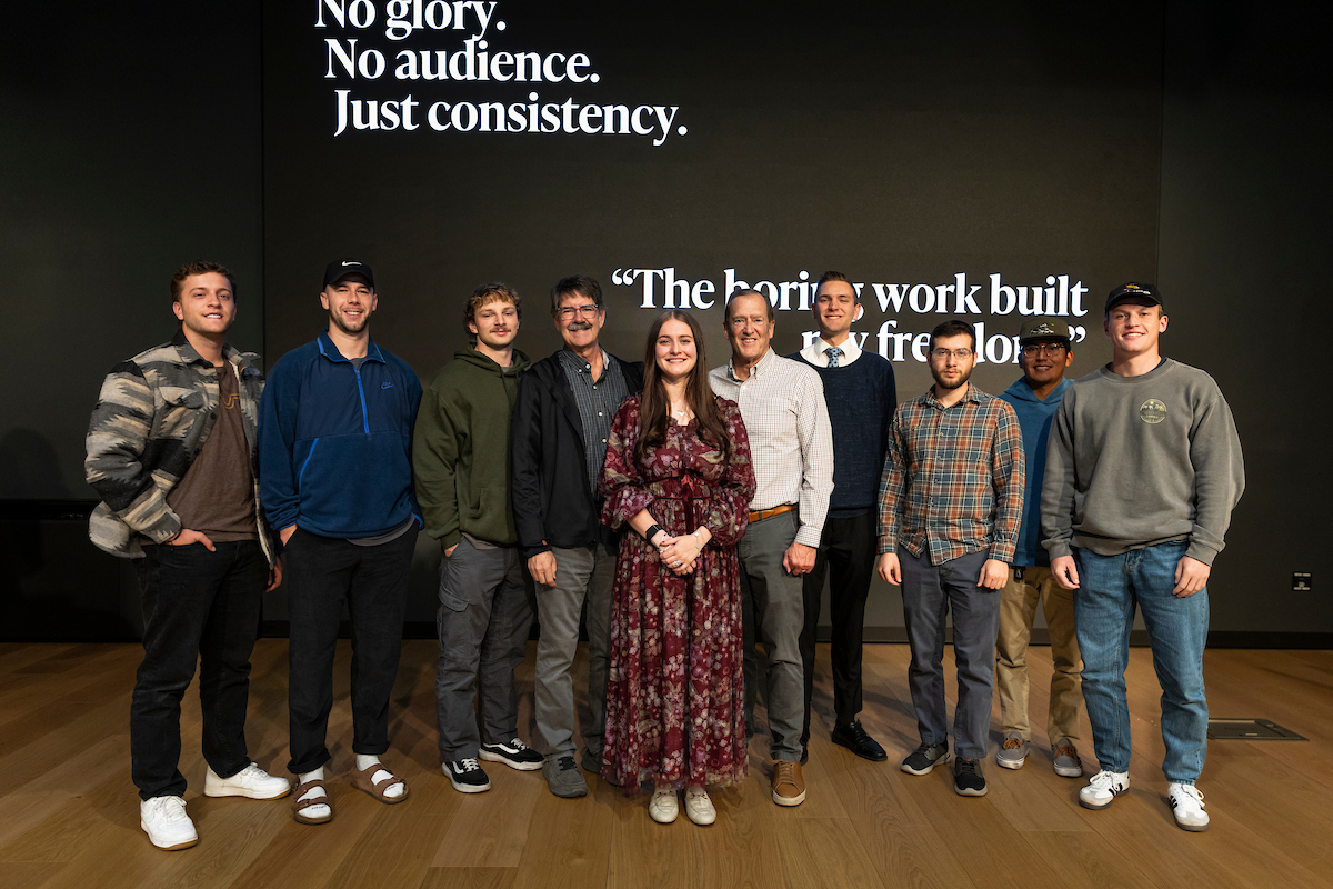 Group photo of McKelle Siebert with UVU students and faculty after her lecture.