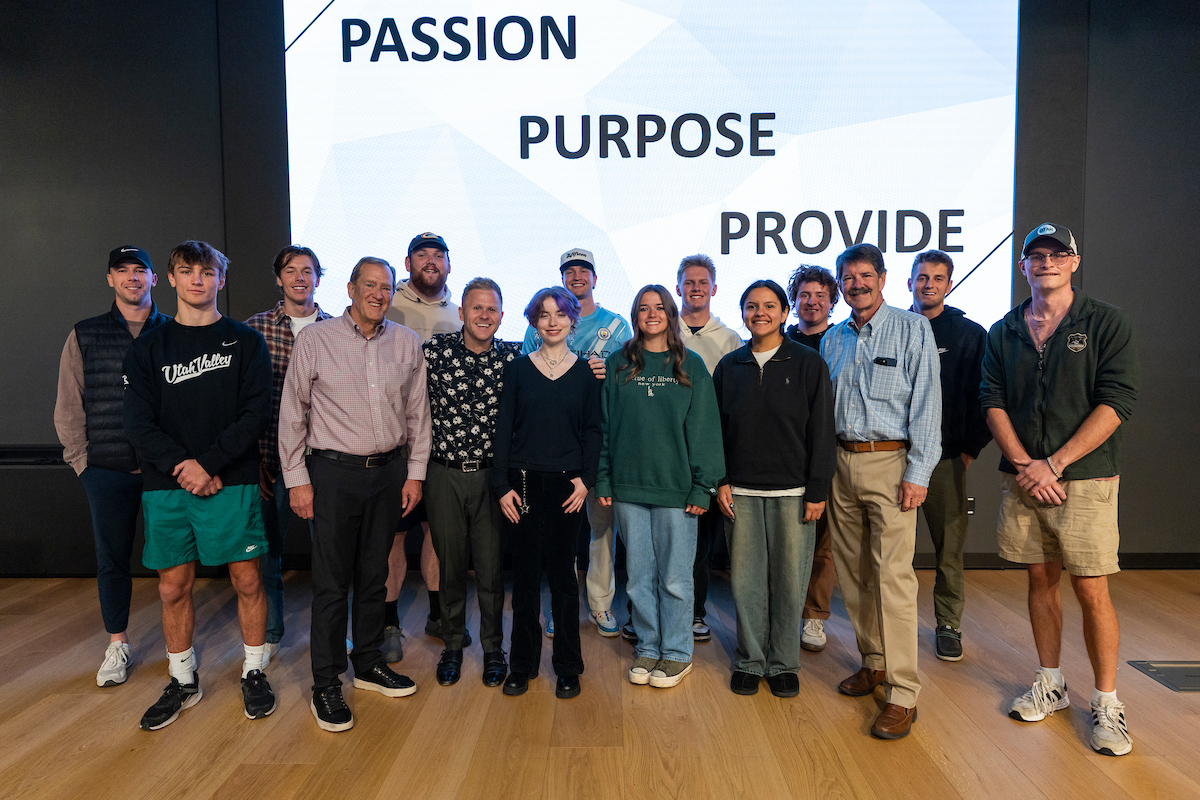 Group photo of Clint Pulver with UVU students and faculty after the lecture.