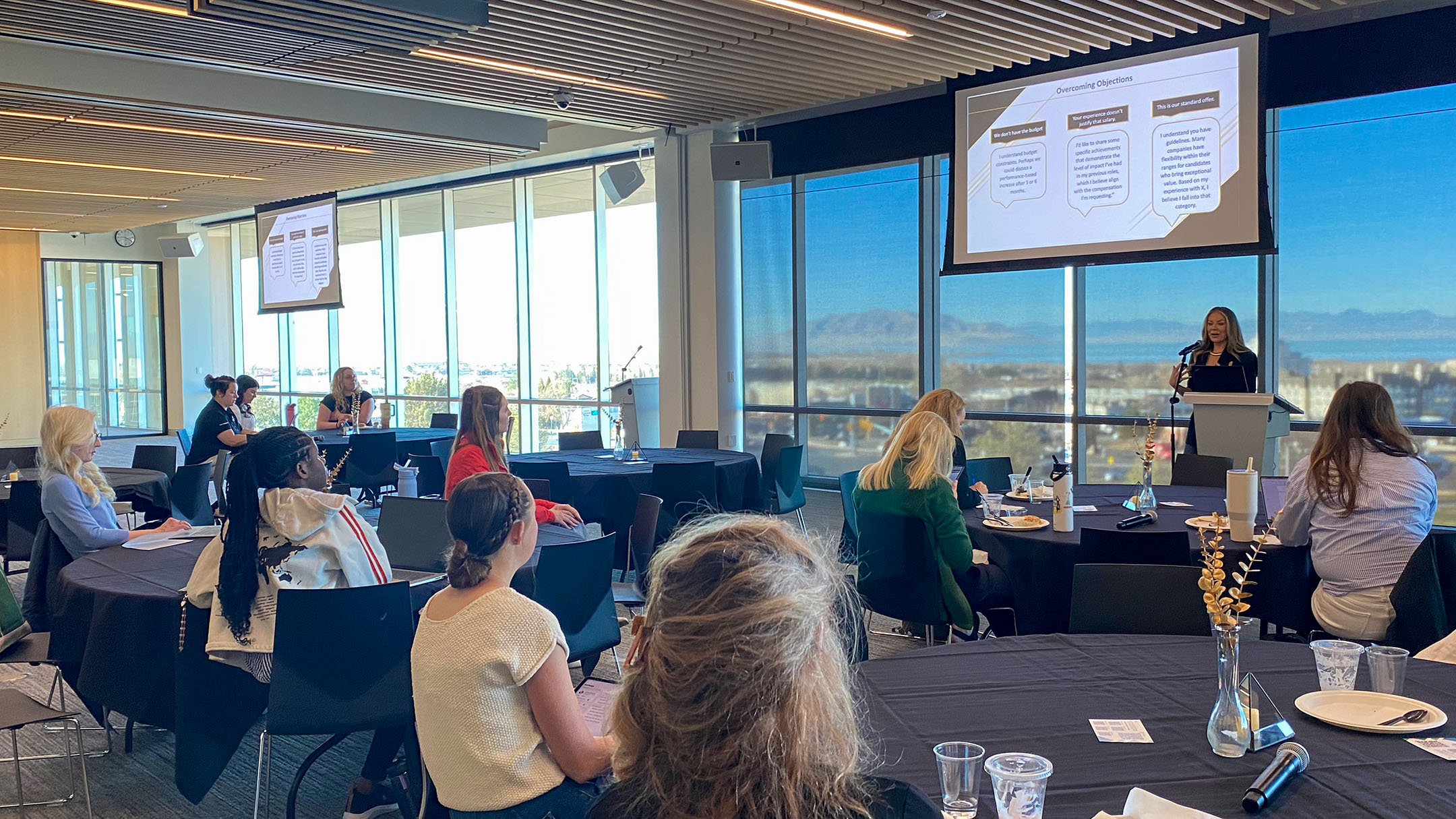 Audience attending Business Impact Lab D.E.N. event on salary negotiation