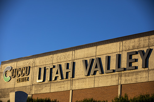 Utah Valley University signage on building with mountain in the background
