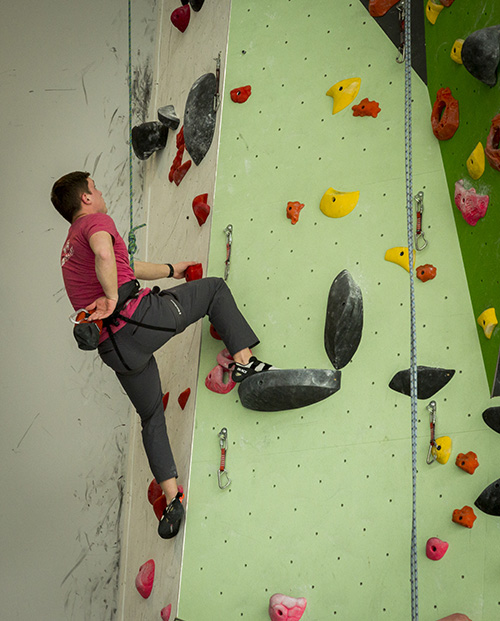 A person rockwall climbing in the SLWC