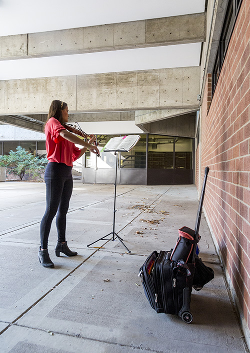 A student practicing violin