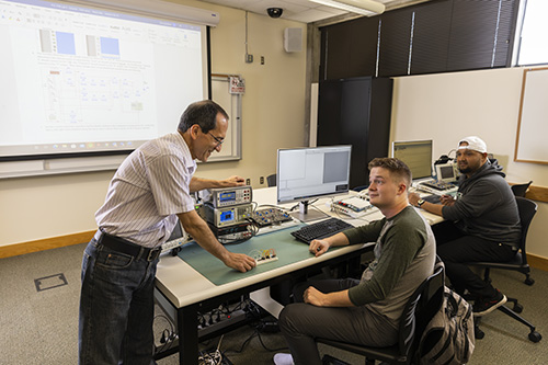 Professor and students in Computer Science program.