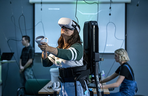 Student in VR headset.